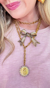 Gold Pearl Bow Necklace