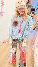 Light Wash Denim Ruffle Hem Top
