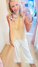 Ecru Turtleneck Sleeveless Top